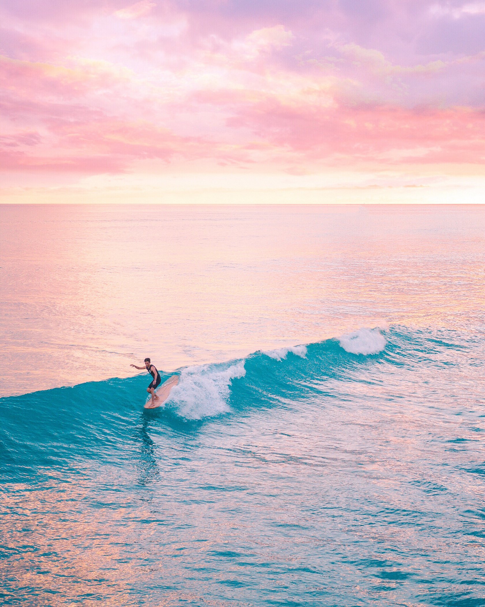 Man Surfing on Sea Waves